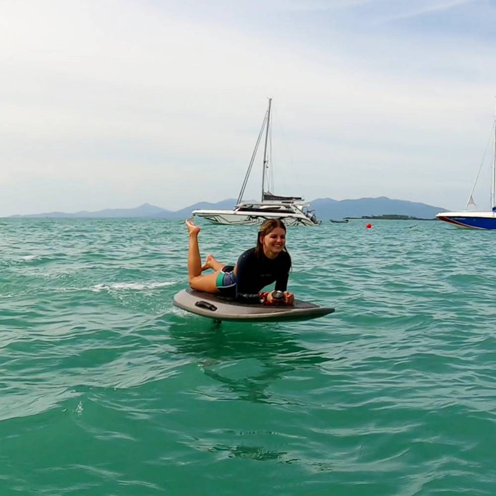 Guest riding lying down on the board
