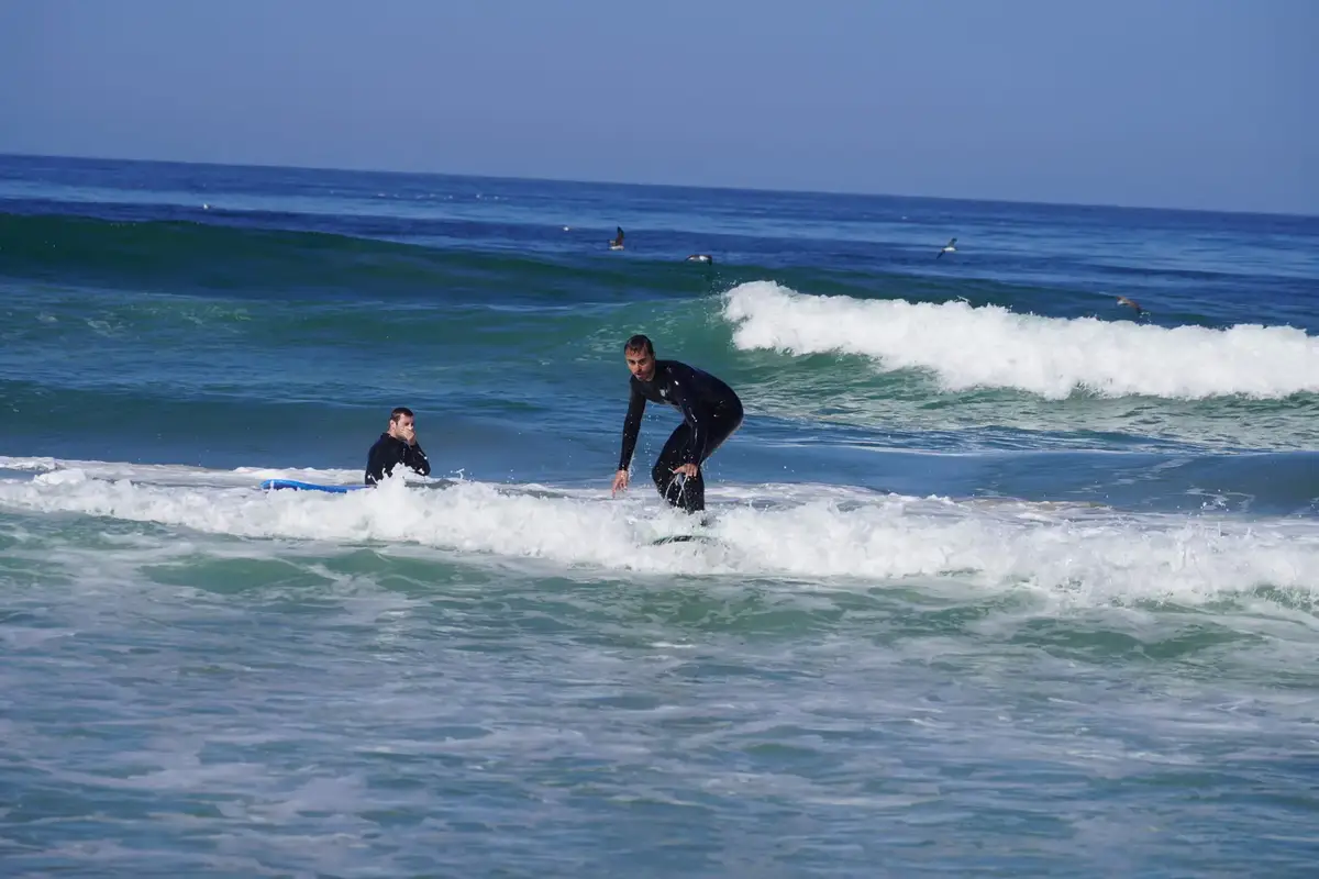 Two surfers in the Atlantic waves near Dakhla