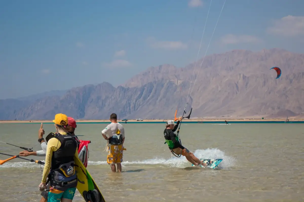 Riders and instructors in the shallow, beginner-friendly water of Dahab Lagoon
